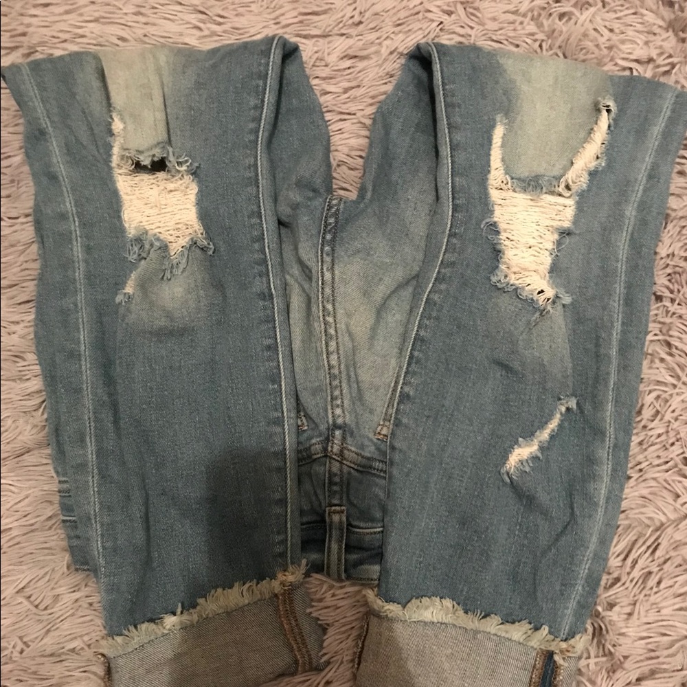 Cropped , cuffed , distressed jeans